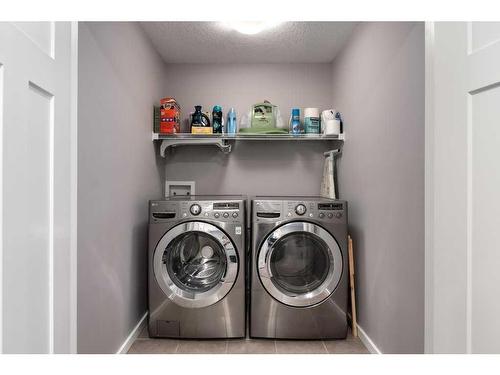 39 Nolanfield Terrace Nw, Calgary, AB - Indoor Photo Showing Laundry Room