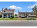 247 & 251 Rundlecairn Road Ne, Calgary, AB  - Outdoor With Facade 