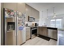 1332-76 Cornerstone Passage Ne, Calgary, AB  - Indoor Photo Showing Kitchen With Stainless Steel Kitchen With Upgraded Kitchen 