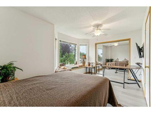 195 Erin Park Drive Se, Calgary, AB - Indoor Photo Showing Bedroom