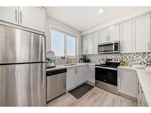 624 Savanna Boulevard Ne, Calgary, AB - Indoor Photo Showing Kitchen With Double Sink