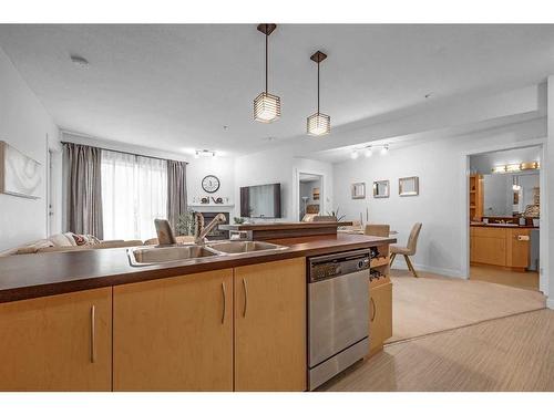 227-69 Springborough Court Sw, Calgary, AB - Indoor Photo Showing Kitchen With Double Sink