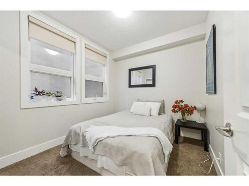 104-41 6A Street Ne, Calgary, AB - Indoor Photo Showing Bedroom