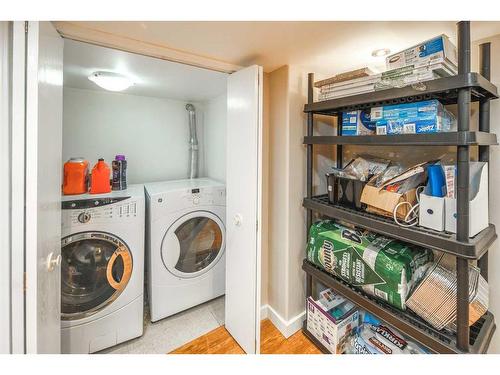 68 Woodglen Close Sw, Calgary, AB - Indoor Photo Showing Laundry Room