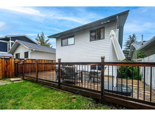 68 Woodglen Close Sw, Calgary, AB - Outdoor With Deck Patio Veranda With Exterior