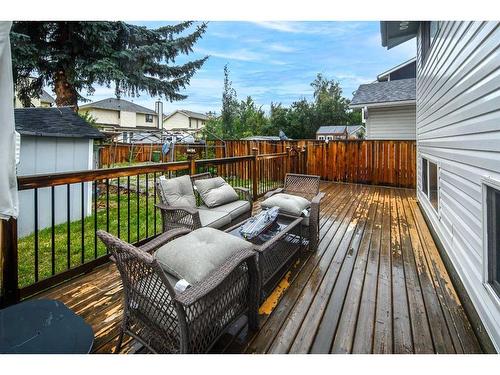 68 Woodglen Close Sw, Calgary, AB - Outdoor With Deck Patio Veranda With Exterior