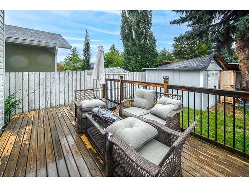 68 Woodglen Close Sw, Calgary, AB - Outdoor With Deck Patio Veranda With Exterior