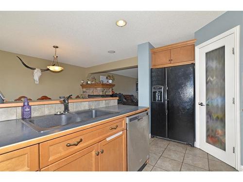 226 Evansmeade Close Nw, Calgary, AB - Indoor Photo Showing Kitchen With Double Sink