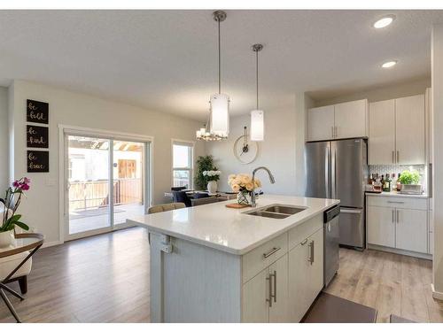 294 Walgrove Boulevard Se, Calgary, AB - Indoor Photo Showing Kitchen With Double Sink With Upgraded Kitchen