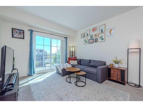 3412-99 Copperstone Park Se, Calgary, AB - Indoor Photo Showing Living Room