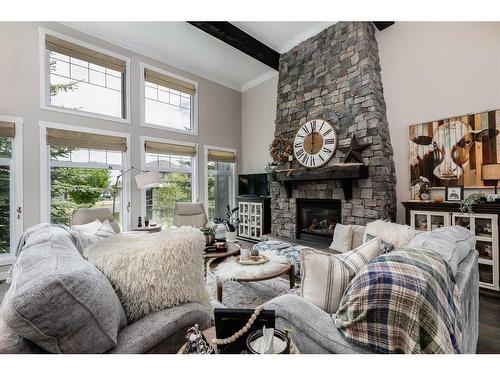 12 Liberty Place, Sylvan Lake, AB - Indoor Photo Showing Living Room With Fireplace