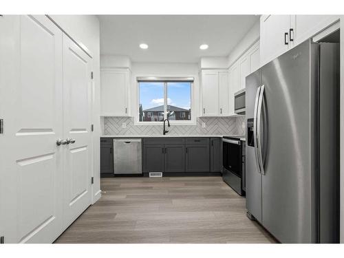 443 Livingston Way Ne, Calgary, AB - Indoor Photo Showing Kitchen With Stainless Steel Kitchen With Upgraded Kitchen