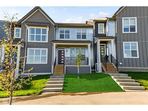 443 Livingston Way Ne, Calgary, AB - Outdoor With Deck Patio Veranda With Facade