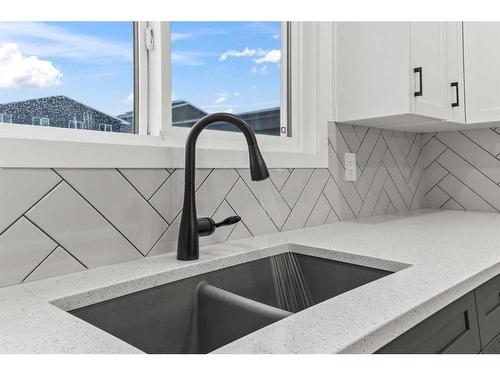 443 Livingston Way Ne, Calgary, AB - Indoor Photo Showing Kitchen With Double Sink