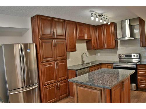 703-128 2 Avenue Se, Calgary, AB - Indoor Photo Showing Kitchen With Stainless Steel Kitchen With Double Sink