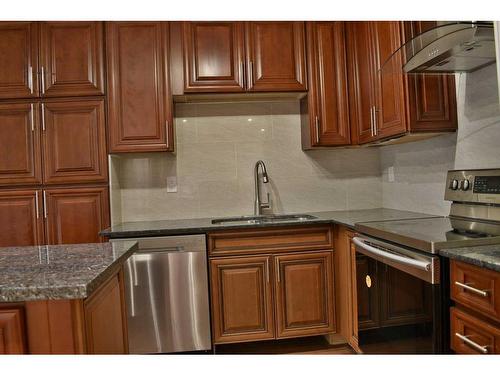 703-128 2 Avenue Se, Calgary, AB - Indoor Photo Showing Kitchen With Stainless Steel Kitchen