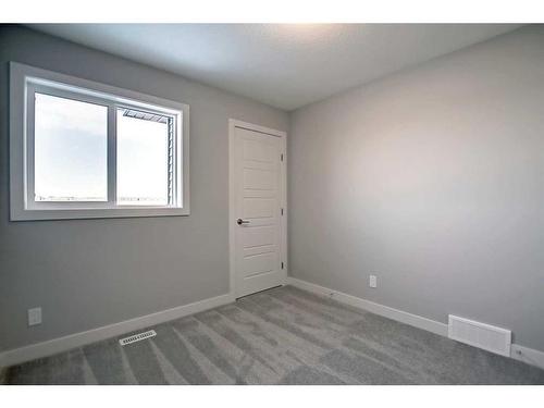 332 Waterford Boulevard, Chestermere, AB - Indoor Photo Showing Other Room