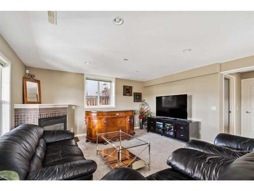 69 Evansbrooke Park Nw, Calgary, AB - Indoor Photo Showing Living Room With Fireplace