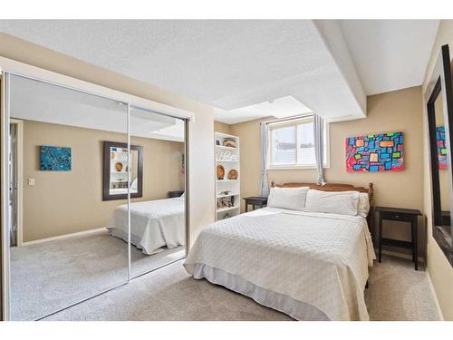 69 Evansbrooke Park Nw, Calgary, AB - Indoor Photo Showing Bedroom