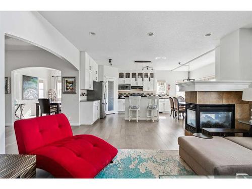 69 Evansbrooke Park Nw, Calgary, AB - Indoor Photo Showing Living Room With Fireplace