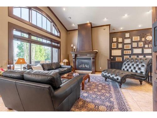 4623 62 Avenue, Taber, AB - Indoor Photo Showing Living Room With Fireplace