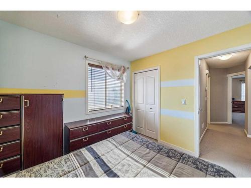 90 Cranberry Close Se, Calgary, AB - Indoor Photo Showing Bedroom