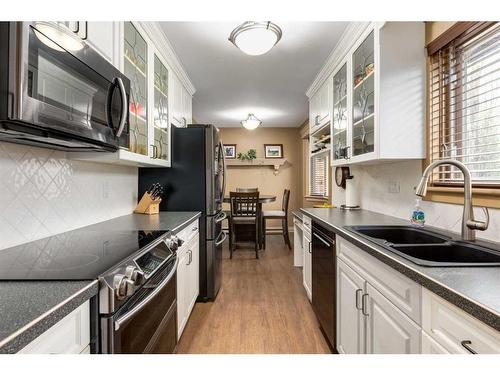 2211 45 Street Se, Calgary, AB - Indoor Photo Showing Kitchen With Double Sink With Upgraded Kitchen