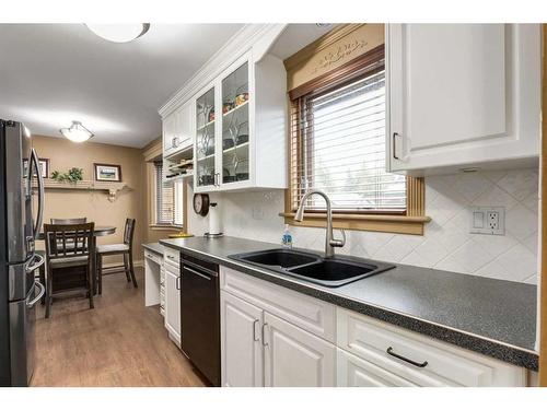 2211 45 Street Se, Calgary, AB - Indoor Photo Showing Kitchen With Double Sink