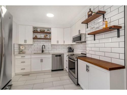 58 27 Avenue Sw, Calgary, AB - Indoor Photo Showing Kitchen With Stainless Steel Kitchen With Upgraded Kitchen