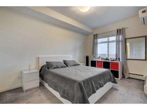 409-6603 New Brighton Avenue Se, Calgary, AB - Indoor Photo Showing Bedroom