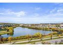 409-6603 New Brighton Avenue Se, Calgary, AB  - Outdoor With Body Of Water With View 