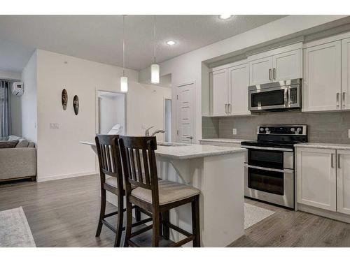 409-6603 New Brighton Avenue Se, Calgary, AB - Indoor Photo Showing Kitchen