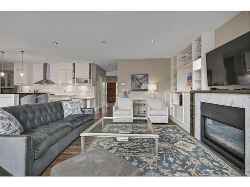 528 49 Avenue Sw, Calgary, AB - Indoor Photo Showing Living Room With Fireplace