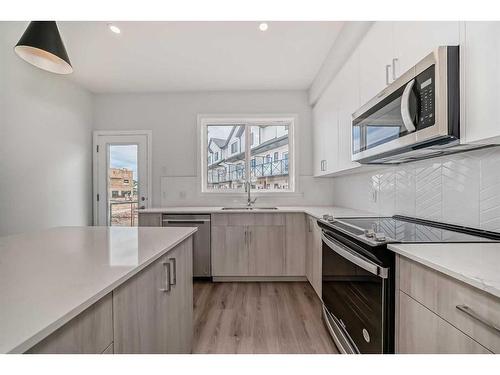 334 Ambleton Street Nw, Calgary, AB - Indoor Photo Showing Kitchen With Upgraded Kitchen