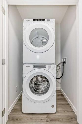 334 Ambleton Street Nw, Calgary, AB - Indoor Photo Showing Laundry Room