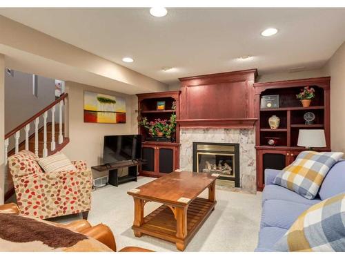 122 Douglasview Rise Se, Calgary, AB - Indoor Photo Showing Living Room With Fireplace