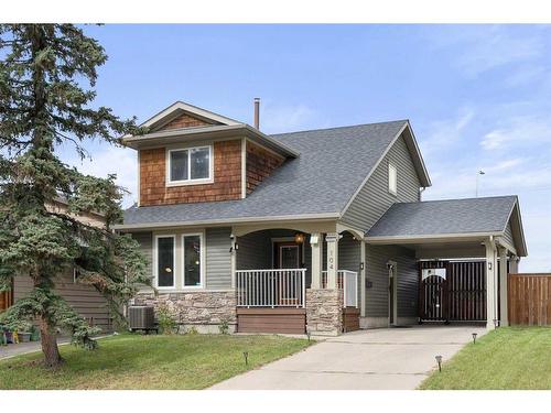 104 Bedford Circle Ne, Calgary, AB - Outdoor With Deck Patio Veranda With Facade