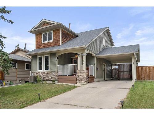 104 Bedford Circle Ne, Calgary, AB - Outdoor With Deck Patio Veranda With Facade