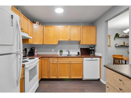 303-1919 17 Avenue Sw, Calgary, AB - Indoor Photo Showing Kitchen With Double Sink