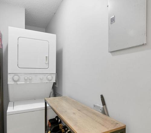 303-1919 17 Avenue Sw, Calgary, AB - Indoor Photo Showing Laundry Room