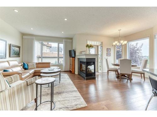 2 Cranridge Heights Se, Calgary, AB - Indoor Photo Showing Living Room With Fireplace