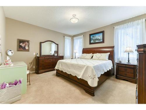 2 Cranridge Heights Se, Calgary, AB - Indoor Photo Showing Bedroom