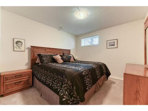 2 Cranridge Heights Se, Calgary, AB - Indoor Photo Showing Bedroom