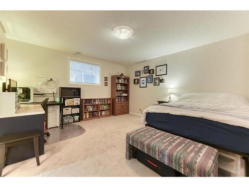 2 Cranridge Heights Se, Calgary, AB - Indoor Photo Showing Bedroom