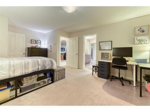 2 Cranridge Heights Se, Calgary, AB - Indoor Photo Showing Bedroom