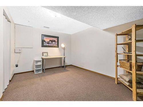 1 Hunters Crescent, Okotoks, AB - Indoor Photo Showing Other Room