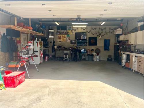 1 Hunters Crescent, Okotoks, AB - Indoor Photo Showing Garage