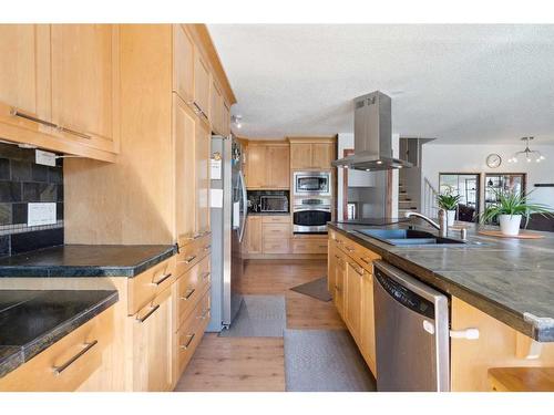 215 Shawcliffe Circle Sw, Calgary, AB - Indoor Photo Showing Kitchen With Double Sink