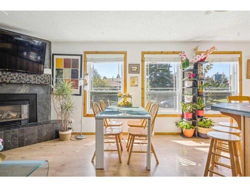 215 Shawcliffe Circle Sw, Calgary, AB - Indoor With Fireplace