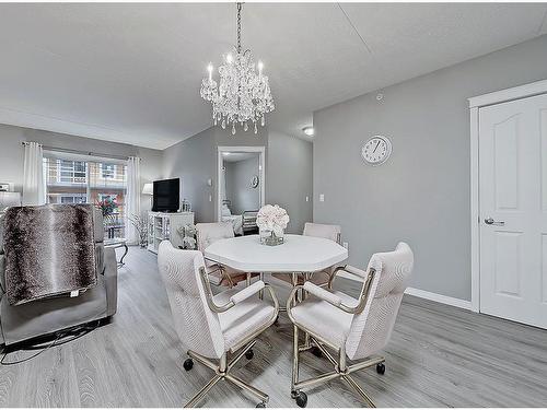 205-400 1 Avenue Se, Diamond Valley, AB - Indoor Photo Showing Dining Room